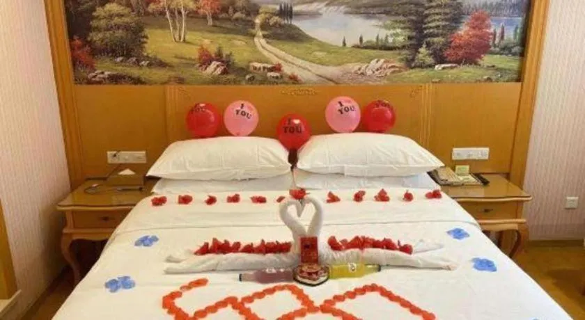 Bed in Vienna Hotel Guangdong Huiyang Qiuchang Yingbin Road