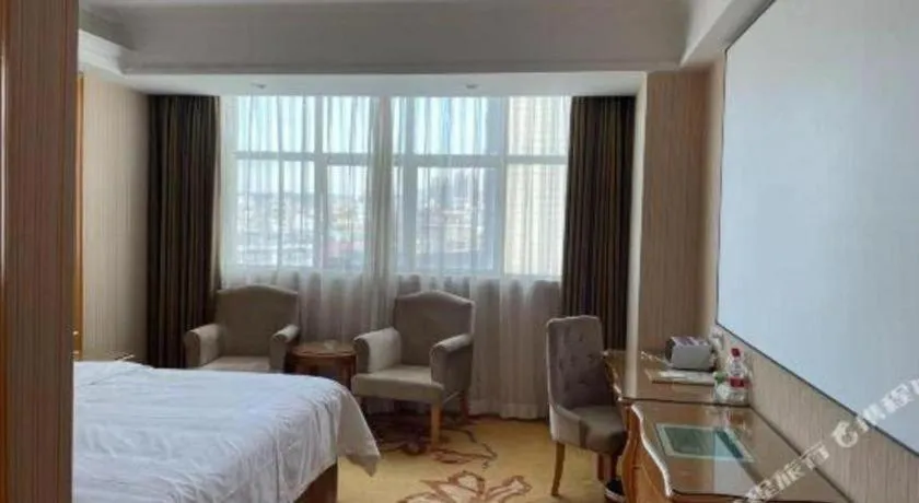 Bed in Vienna Hotel Guangdong Huiyang Qiuchang Yingbin Road