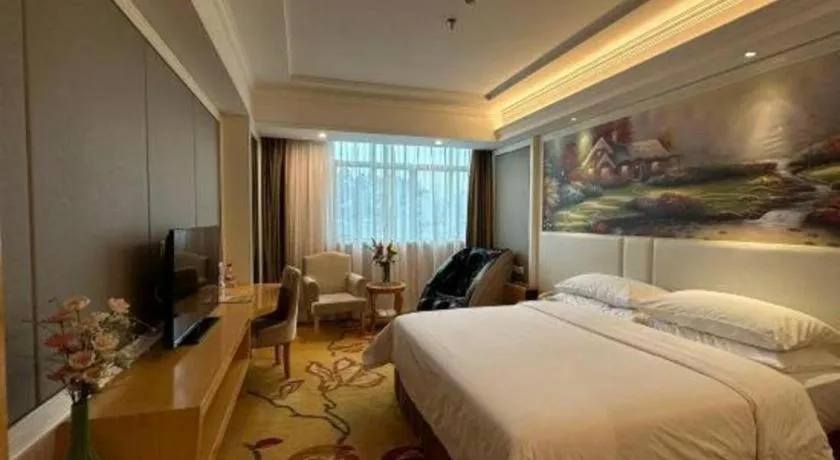 Bed in Vienna Hotel Guangdong Huiyang Qiuchang Yingbin Road