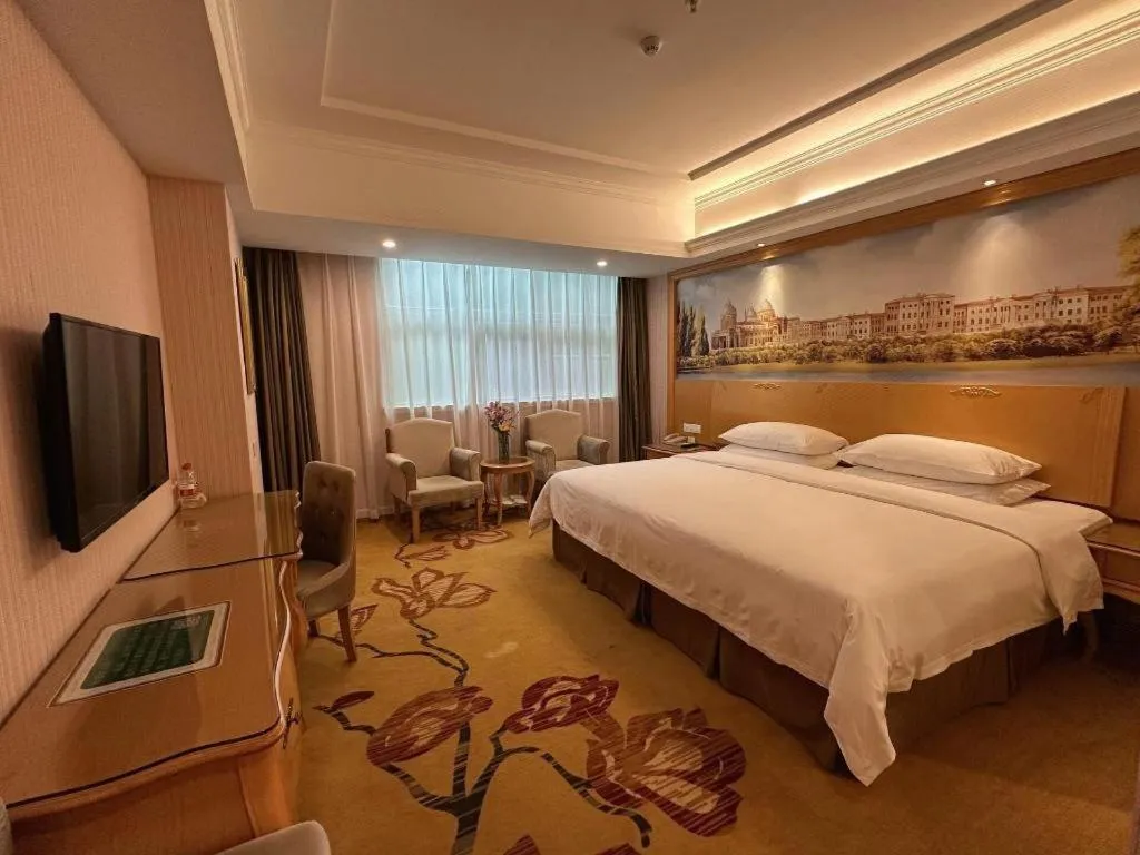 Bed in Vienna Hotel Guangdong Huiyang Qiuchang Yingbin Road