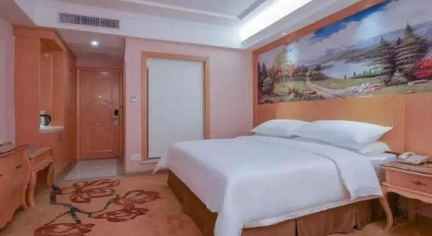 Bed in Vienna Hotel Guangdong Huiyang Qiuchang Yingbin Road