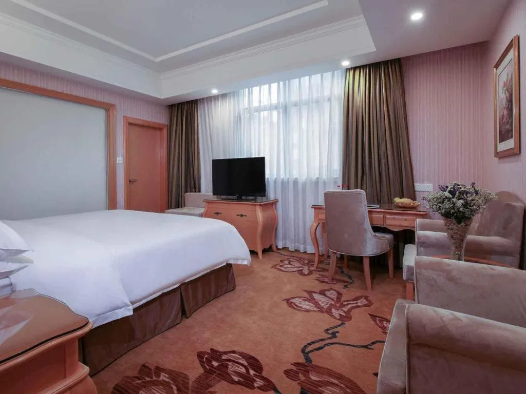 Bed in Vienna Hotel Guangdong Huiyang Qiuchang Yingbin Road