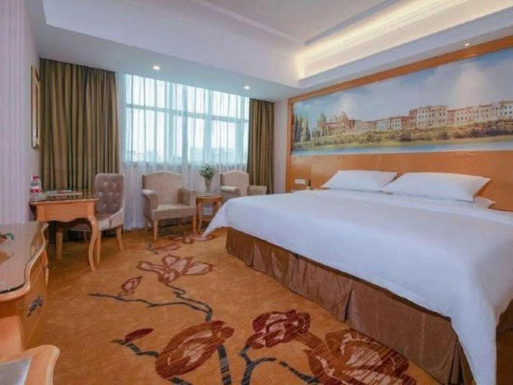 Bed in Vienna Hotel Guangdong Huiyang Qiuchang Yingbin Road