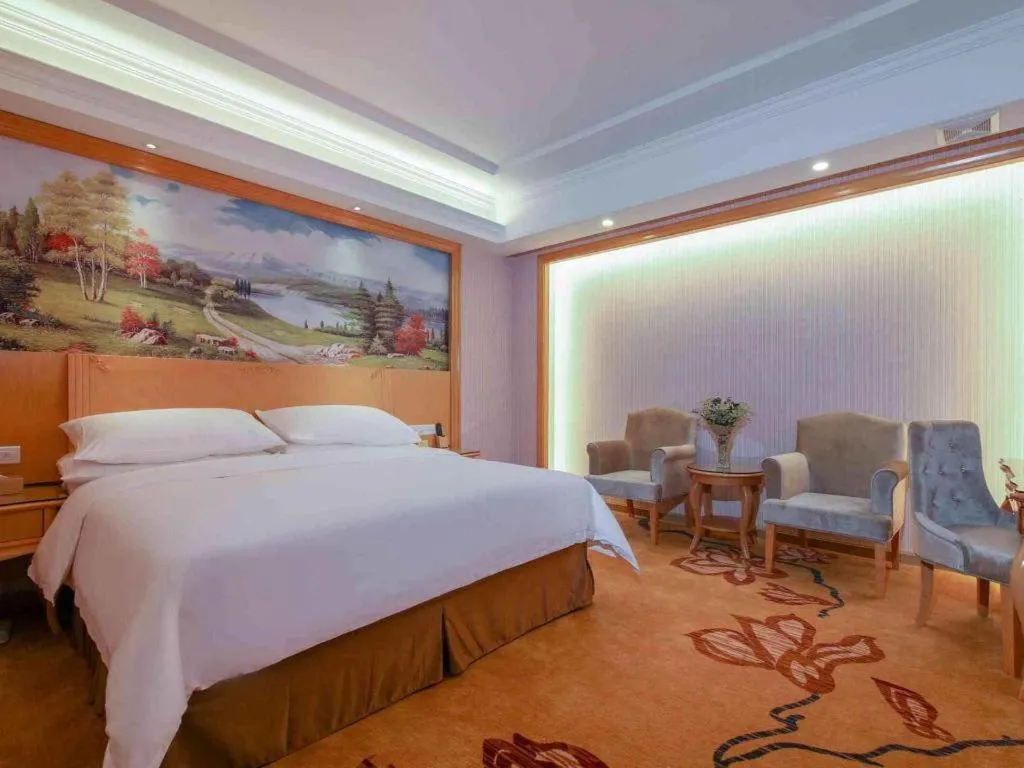 Bed in Vienna Hotel Guangdong Huiyang Qiuchang Yingbin Road