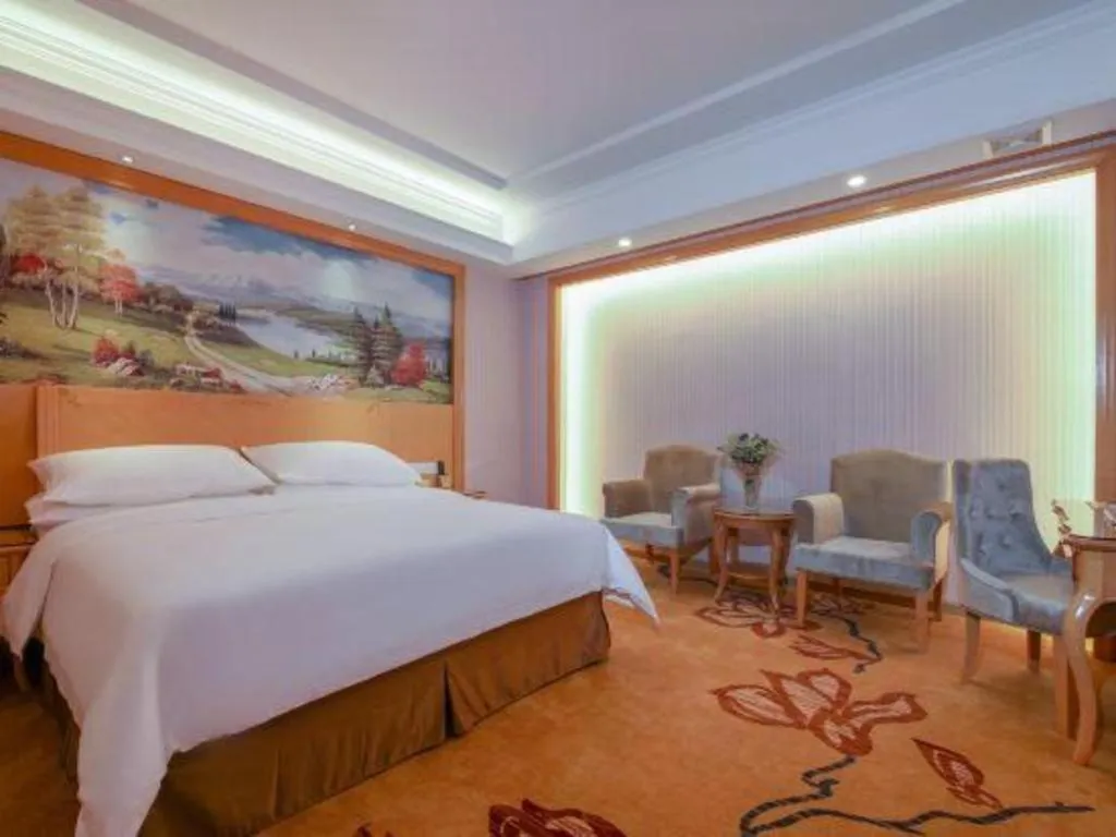 Bed in Vienna Hotel Guangdong Huiyang Qiuchang Yingbin Road