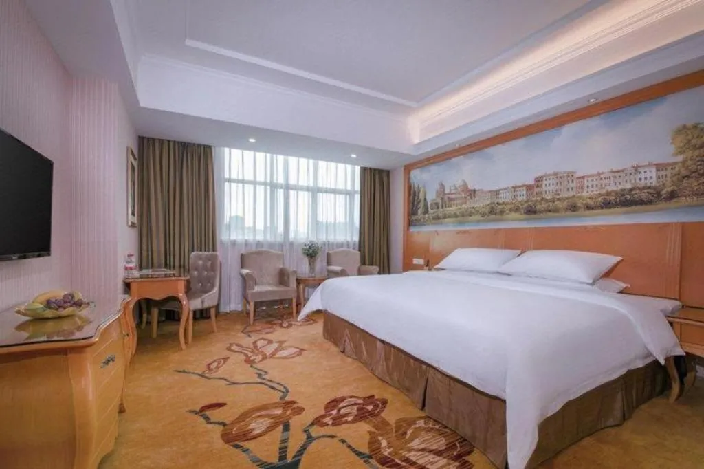 Bed in Vienna Hotel Guangdong Huiyang Qiuchang Yingbin Road