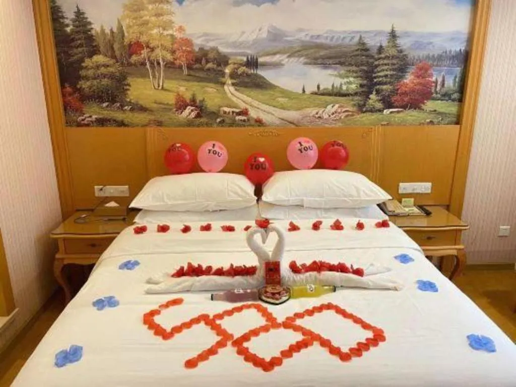 Bed in Vienna Hotel Guangdong Huiyang Qiuchang Yingbin Road