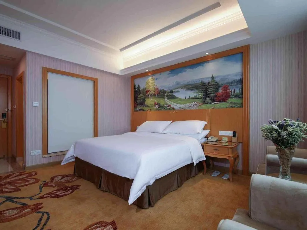 Bed in Vienna Hotel Guangdong Huiyang Qiuchang Yingbin Road
