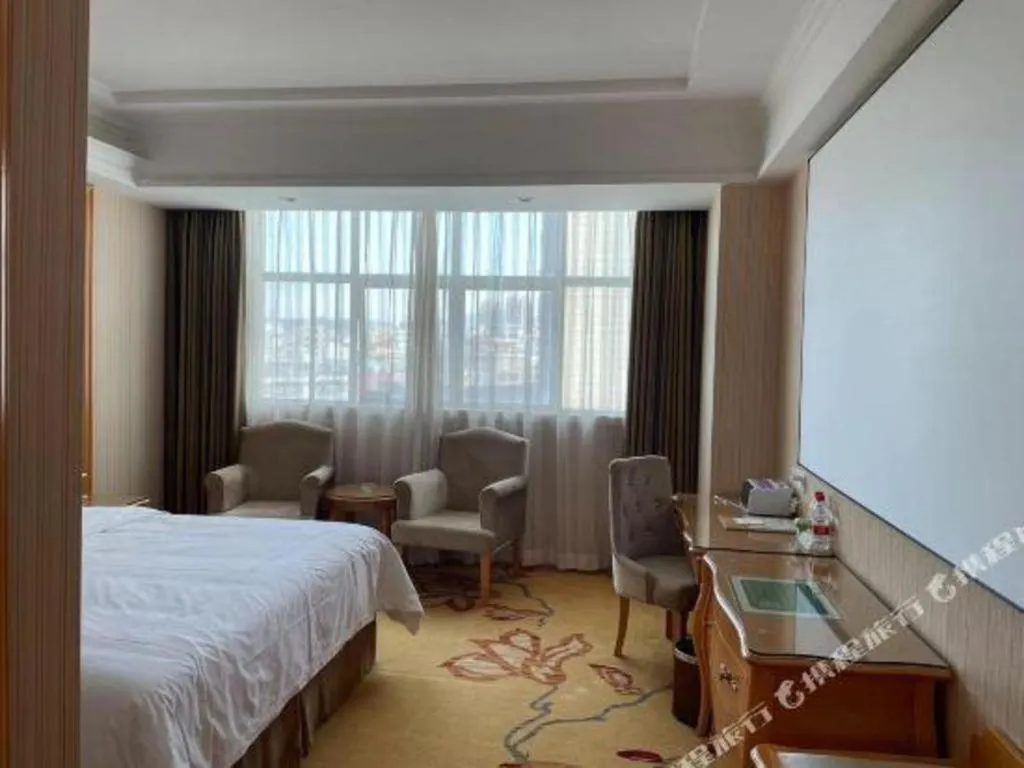 Bed in Vienna Hotel Guangdong Huiyang Qiuchang Yingbin Road