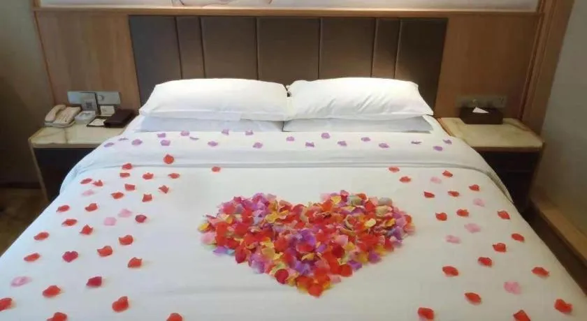 Bed in Venus Royal Hotel Nanning East High-Speed Railway Station