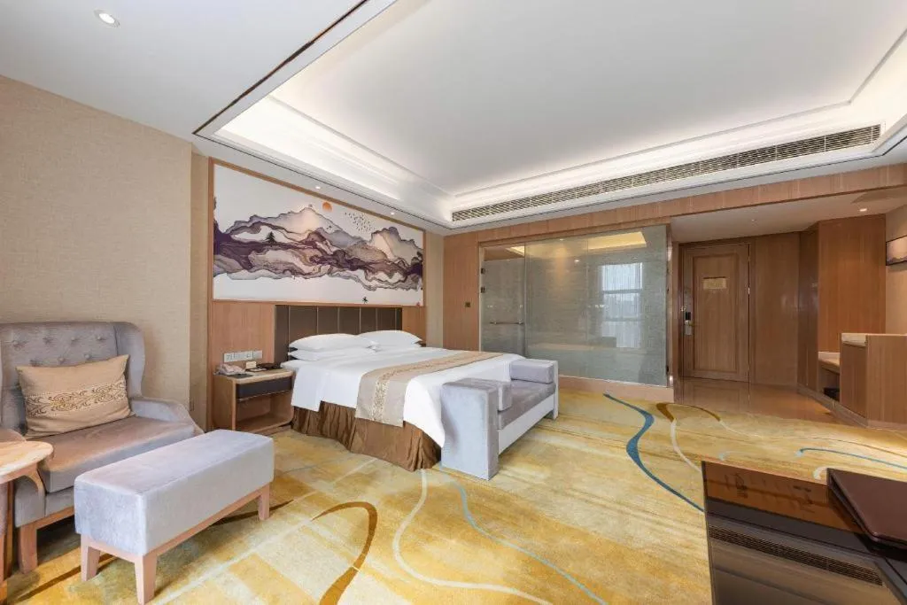 Bed in Venus Royal Hotel Nanning East High-Speed Railway Station