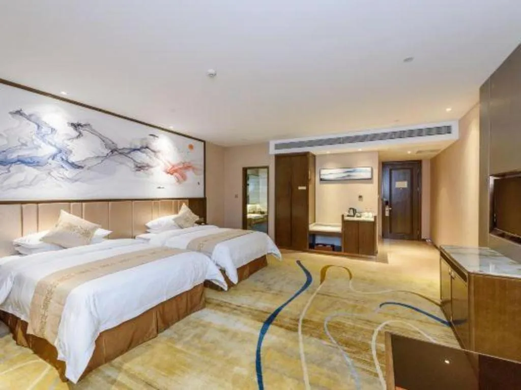 Bed in Venus Royal Hotel Nanning East High-Speed Railway Station