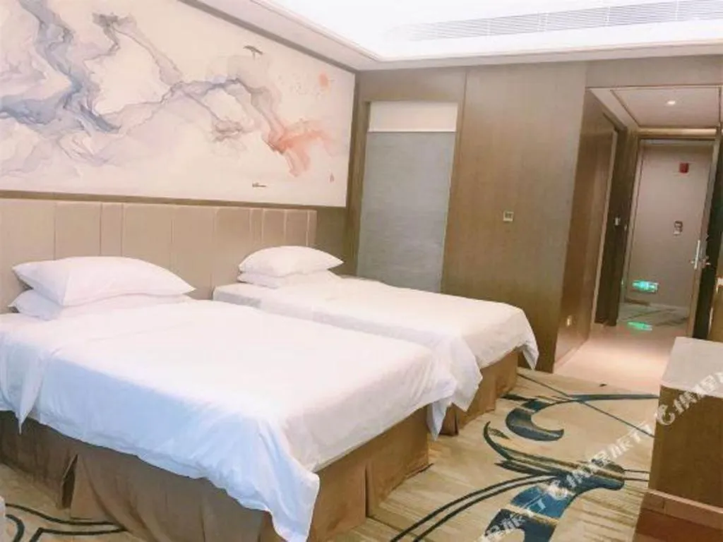 Bed in Venus Royal Hotel Nanning East High-Speed Railway Station