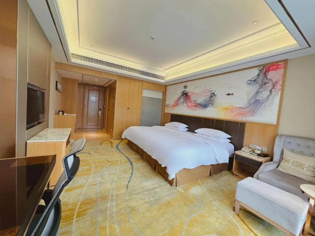 Bed in Venus Royal Hotel Nanning East High-Speed Railway Station