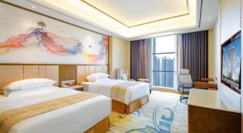 Bed in Venus Royal Hotel Nanning East High-Speed Railway Station