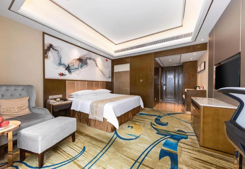 Bed in Venus Royal Hotel Nanning East High-Speed Railway Station