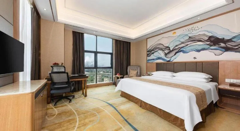 Bed in Venus Royal Hotel Nanning East High-Speed Railway Station