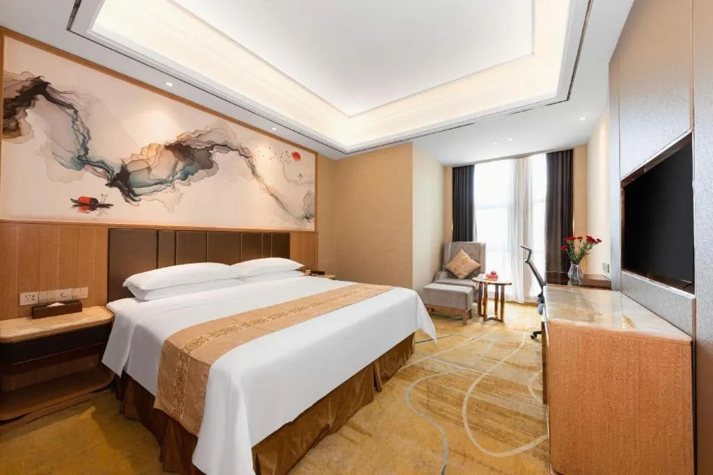 Bed in Venus Royal Hotel Nanning East High-Speed Railway Station