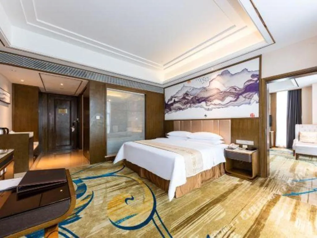 Bed in Venus Royal Hotel Nanning East High-Speed Railway Station
