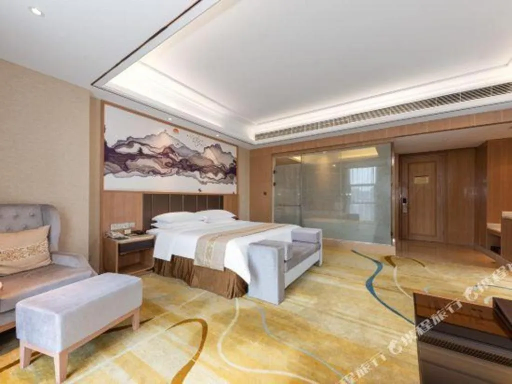 Bed in Venus Royal Hotel Nanning East High-Speed Railway Station