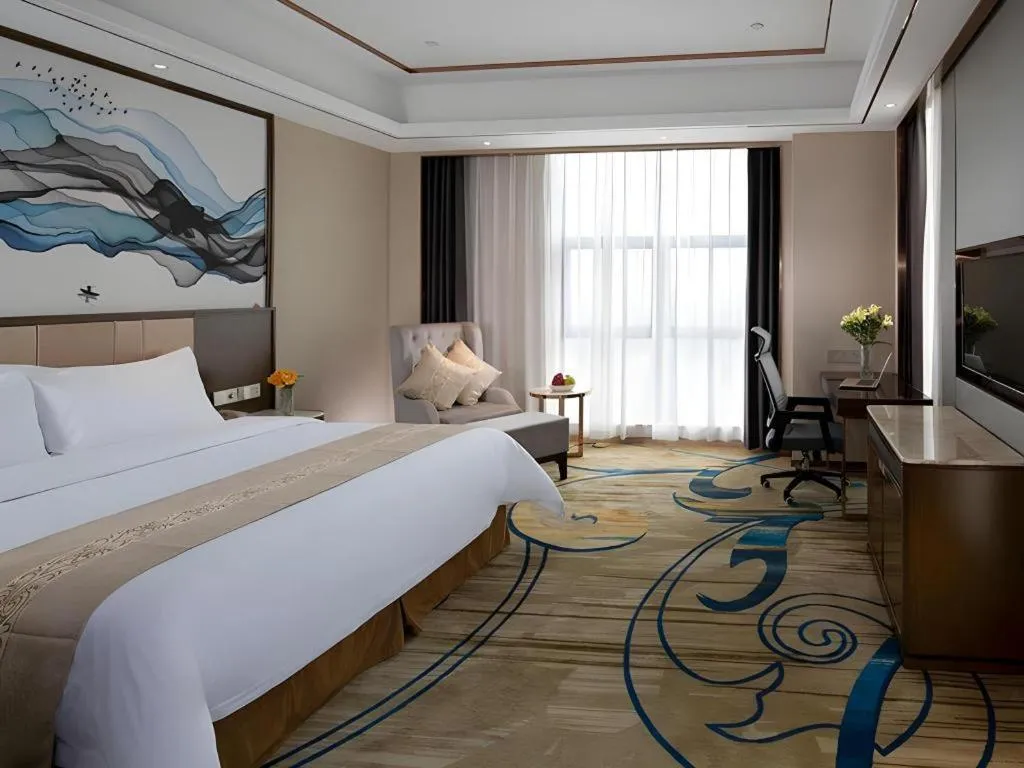 Bed in Venus Royal Hotel Nanning East High-Speed Railway Station