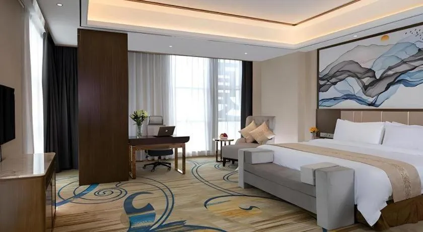 Bed in Venus Royal Hotel Nanning East High-Speed Railway Station