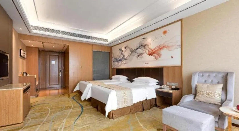 Bed in Venus Royal Hotel Nanning East High-Speed Railway Station