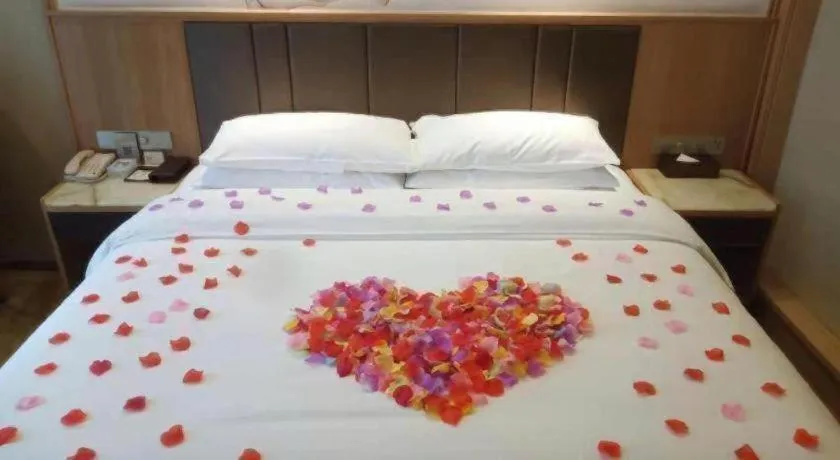 Bed in Venus Royal Hotel Nanning East High-Speed Railway Station