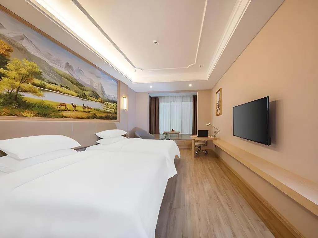 Bed in Vienna Hotel Fuzhou University Town Boshihou