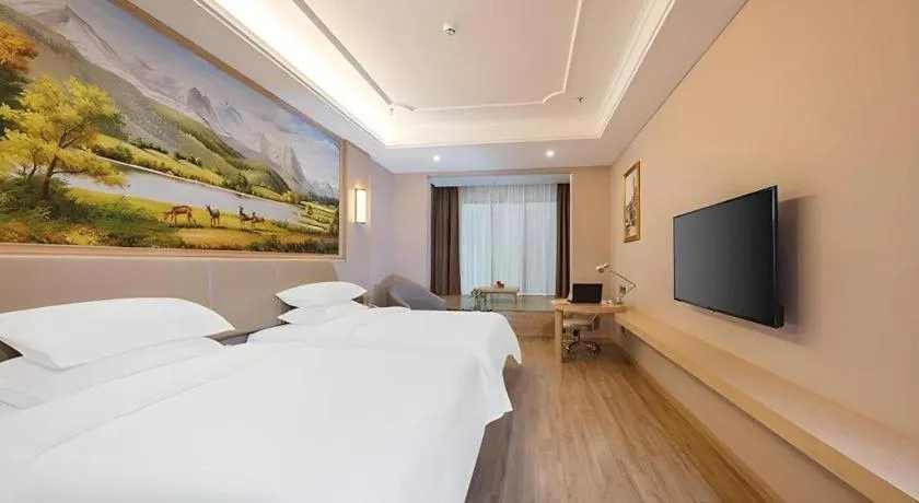 Bed in Vienna Hotel Fuzhou University Town Boshihou
