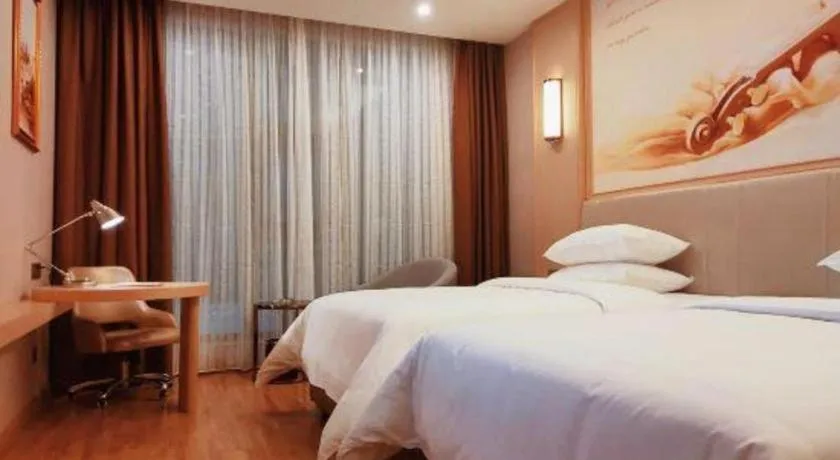 Bed in Vienna Hotel Fuzhou University Town Boshihou