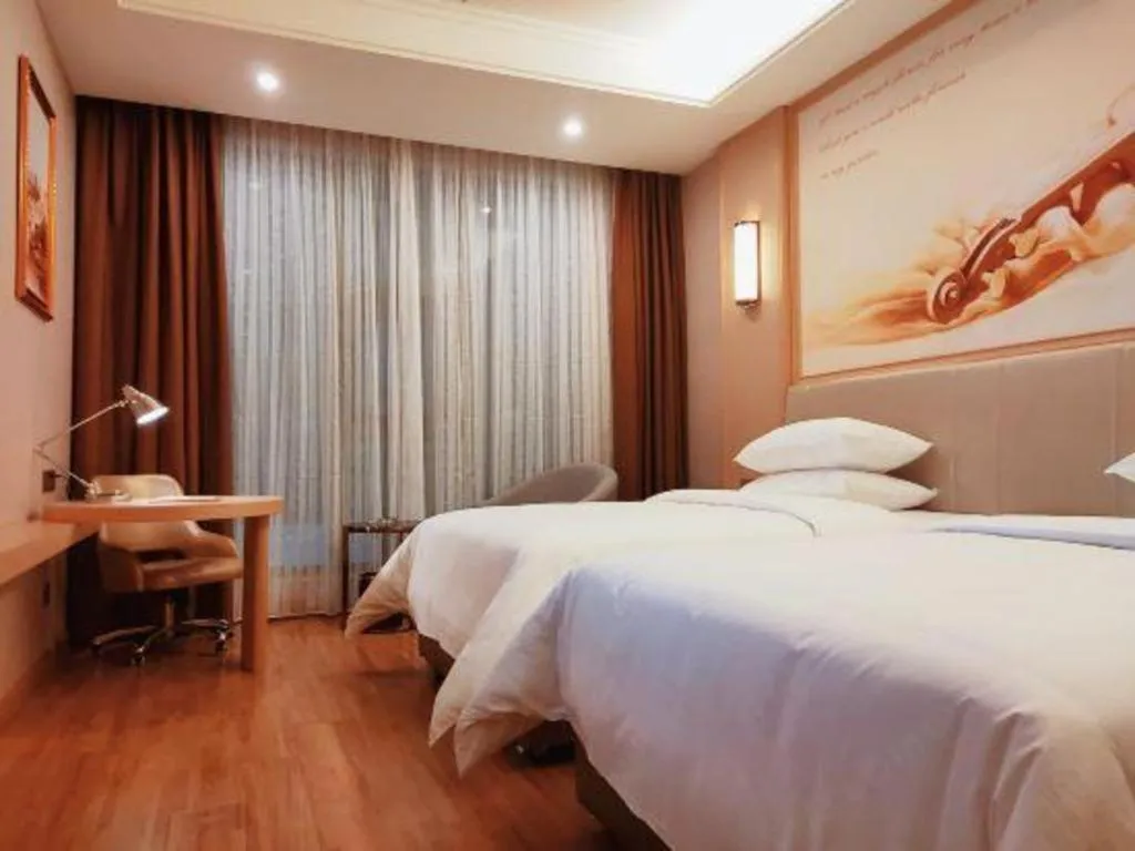 Bed in Vienna Hotel Fuzhou University Town Boshihou