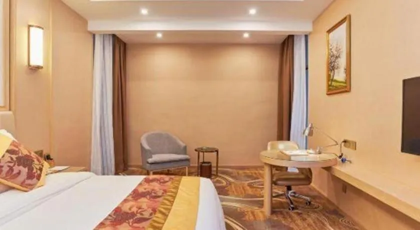 Bed in Vienna Hotel Fuzhou University Town Boshihou