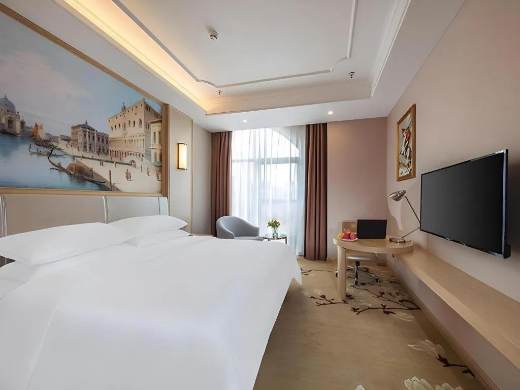 Bed in Vienna Hotel Fuzhou University Town Boshihou