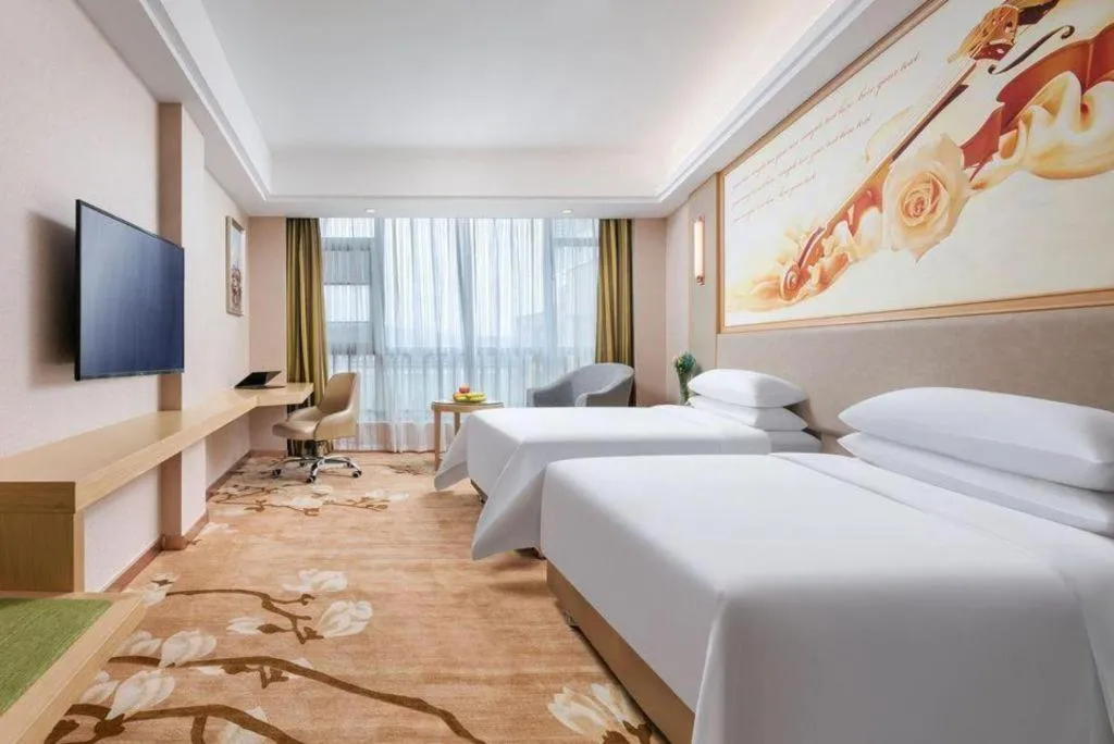 Bed in Vienna Hotel Zhejiang Quzhou Jianglang Mountain Scenic Area Xiakou