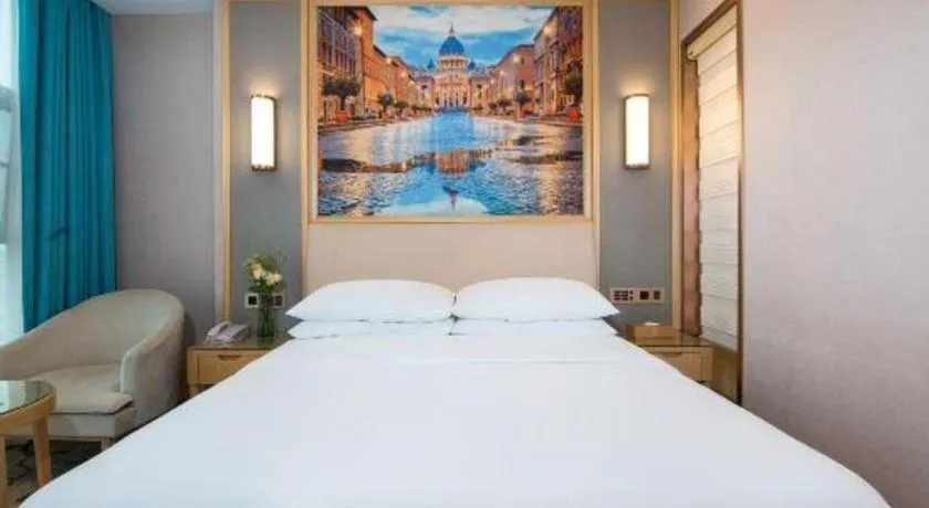 Bed in Vienna Hotel Guangdong Zhaoqing East Station Dinghu Mountain Scenic Area