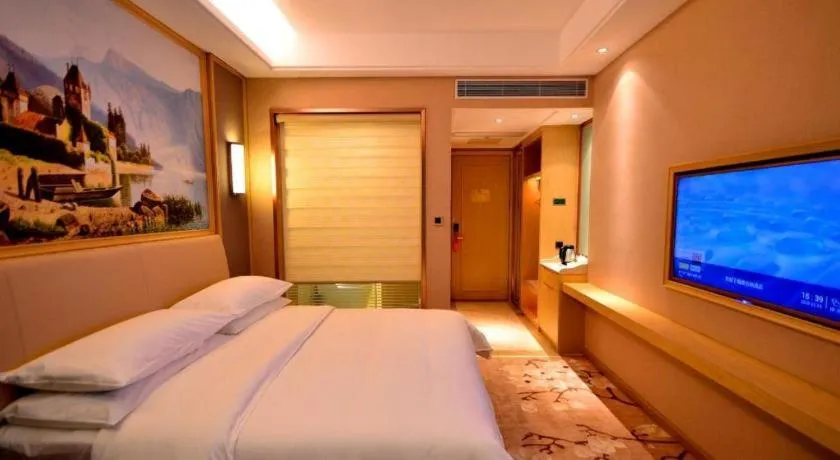 Bed in Vienna Hotel Guangdong Zhaoqing East Station Dinghu Mountain Scenic Area