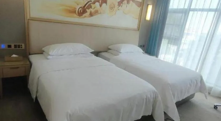 Bed in Vienna Hotel Guangdong Zhaoqing East Station Dinghu Mountain Scenic Area