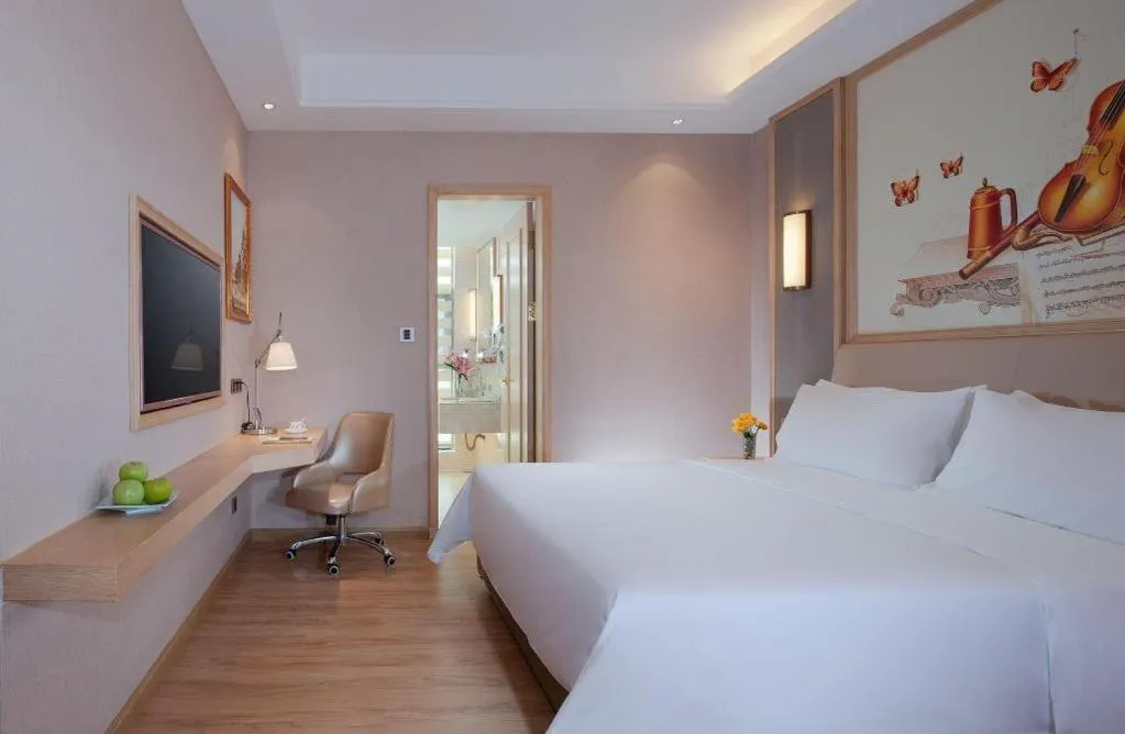 Bed in Vienna Hotel Guangdong Zhaoqing East Station Dinghu Mountain Scenic Area