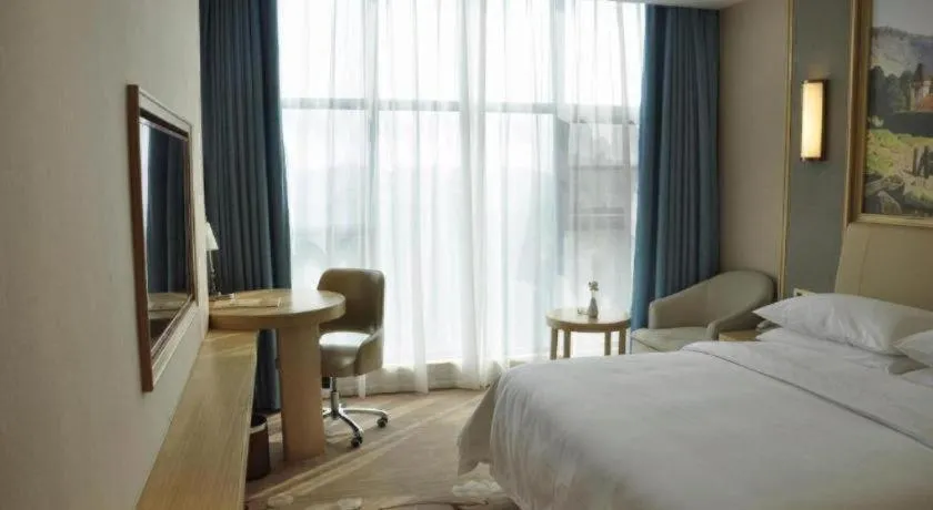Bed in Vienna Hotel Guangdong Zhaoqing East Station Dinghu Mountain Scenic Area