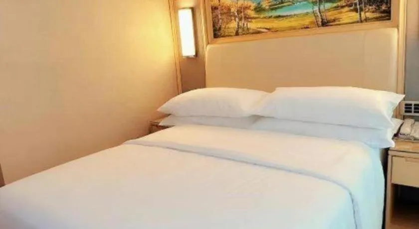 Bed in Vienna Hotel Guangdong Zhaoqing East Station Dinghu Mountain Scenic Area