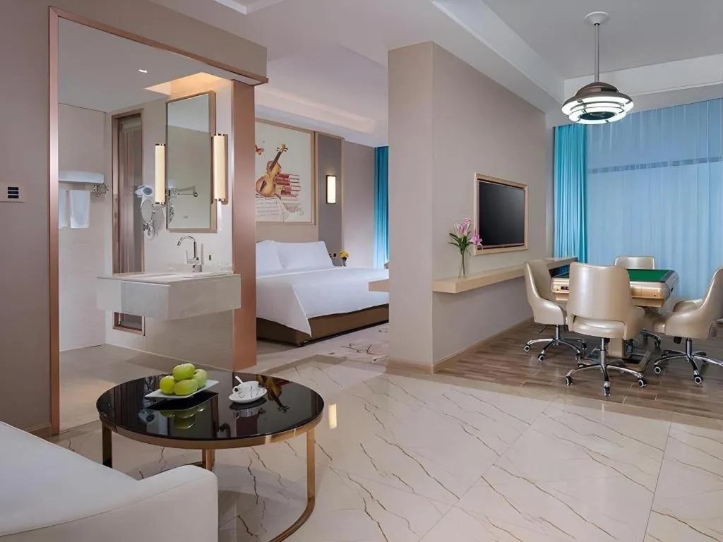 Bed in Vienna Hotel Guangdong Zhaoqing East Station Dinghu Mountain Scenic Area