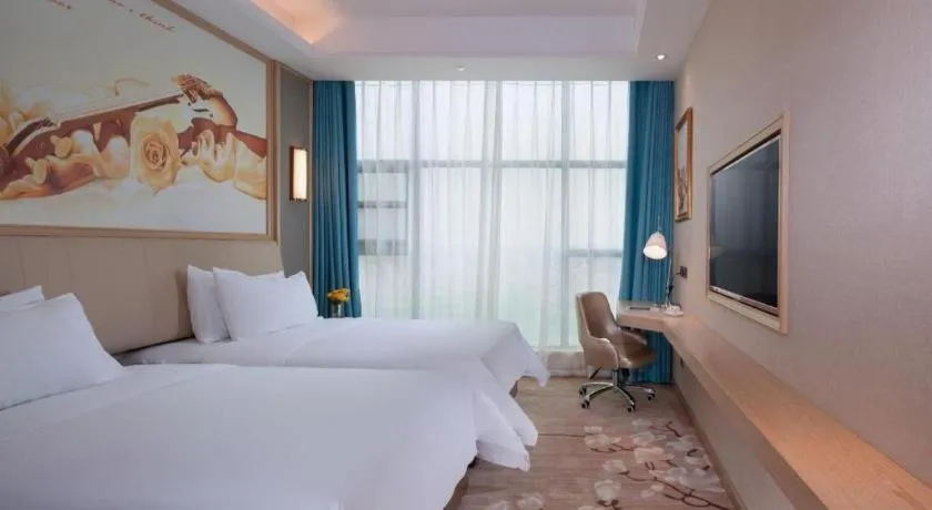 Bed in Vienna Hotel Guangdong Zhaoqing East Station Dinghu Mountain Scenic Area