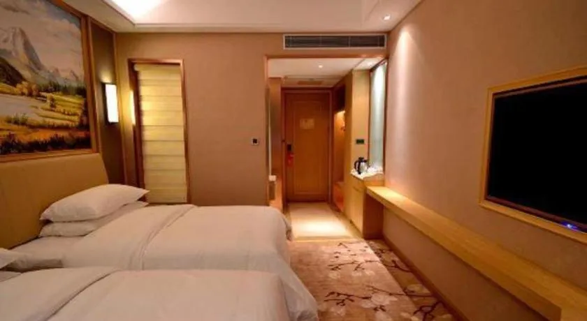 Bed in Vienna Hotel Guangdong Zhaoqing East Station Dinghu Mountain Scenic Area
