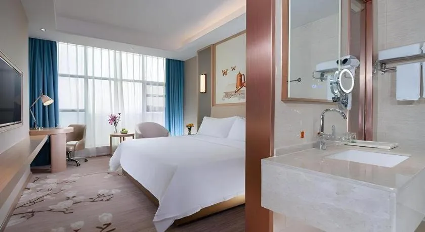 Bed in Vienna Hotel Guangdong Zhaoqing East Station Dinghu Mountain Scenic Area
