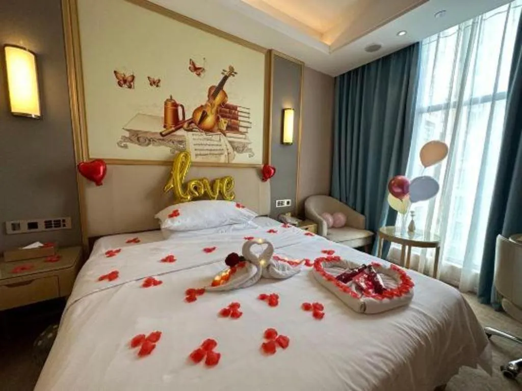 Bed in Vienna Hotel Guangdong Zhaoqing East Station Dinghu Mountain Scenic Area
