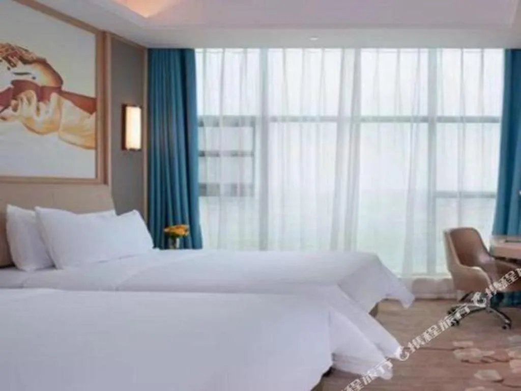 Bed in Vienna Hotel Guangdong Zhaoqing East Station Dinghu Mountain Scenic Area