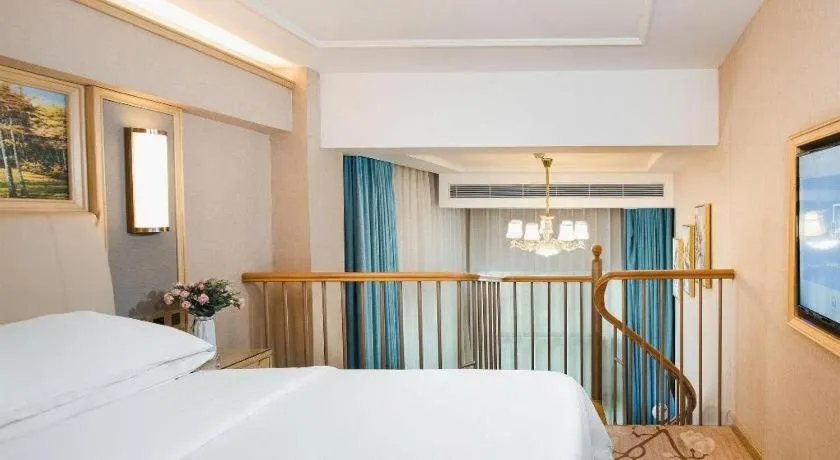 Bed in Vienna Hotel Guangdong Zhaoqing East Station Dinghu Mountain Scenic Area
