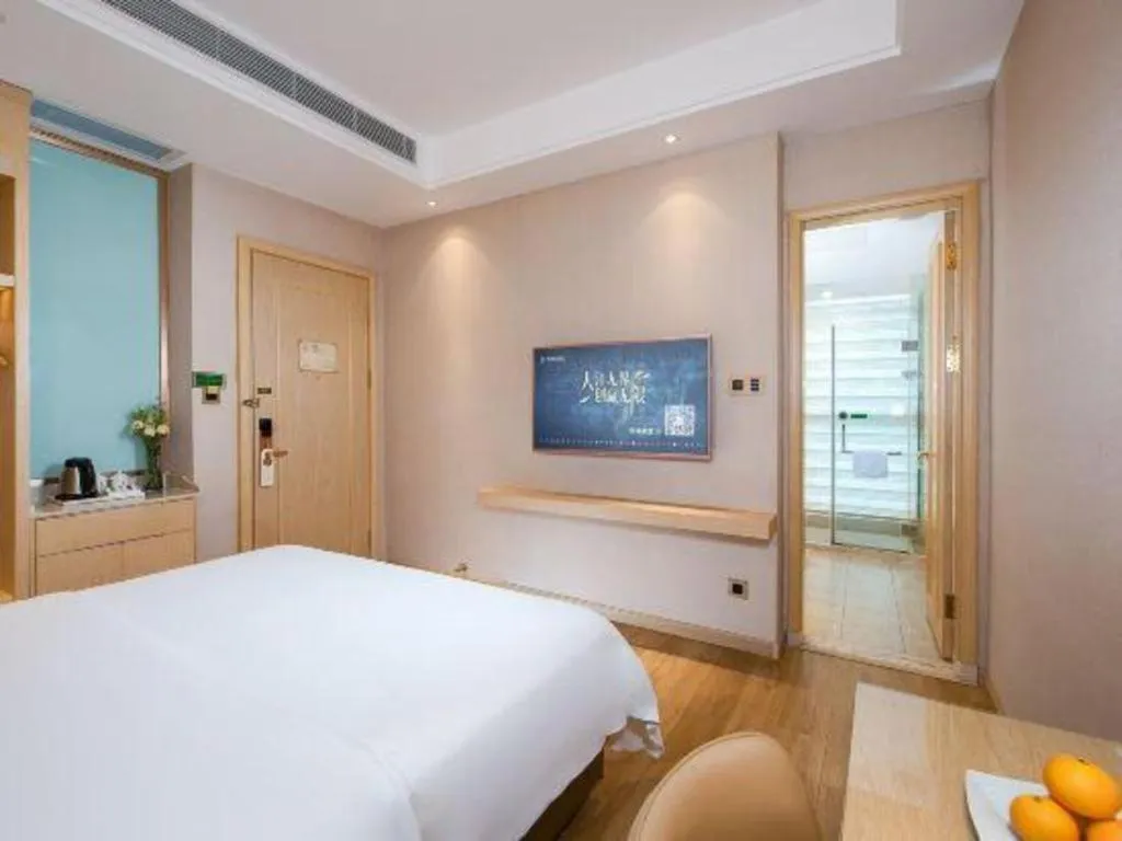 Bed in Vienna Hotel Guangdong Zhaoqing East Station Dinghu Mountain Scenic Area