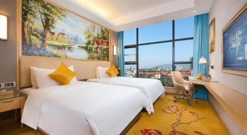 Bed in Vienna Hotel Guangdong Zhaoqing East Station Dinghu Mountain Scenic Area